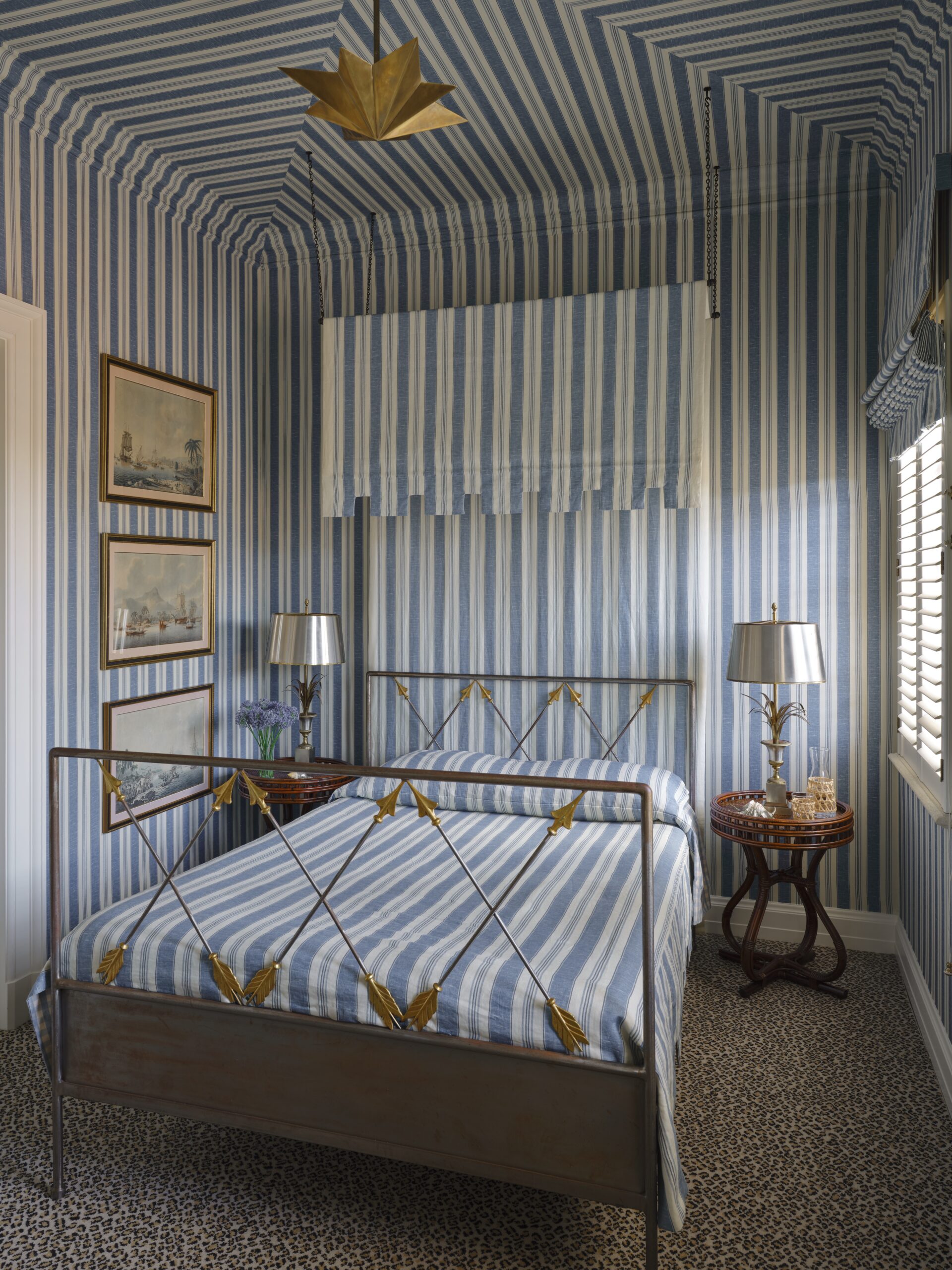 Tom Scheerer's new coffee table book, STILL DECORATING, is absolutely brimming with breathtaking work that is sure to leave every reader inspired. It is filled with perfect examples of this standout designer's peerless style. Beautiful blue and white bedroom with blue and white stripe wallpaper and bedding!