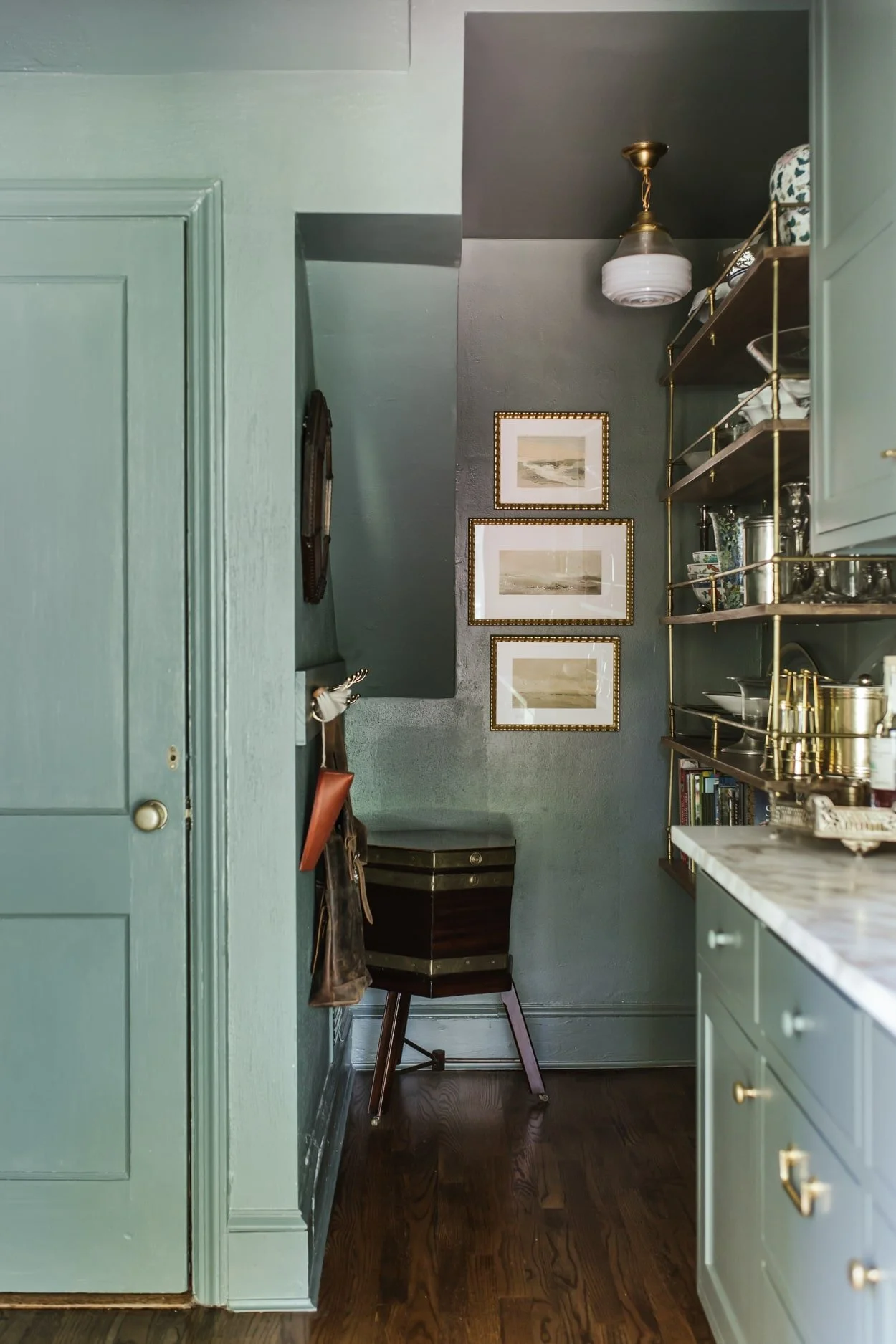 The Misfit House  Photographed  Kristin Karch Photography - love the butler's pantry with the brass wall shelf and green cabinets