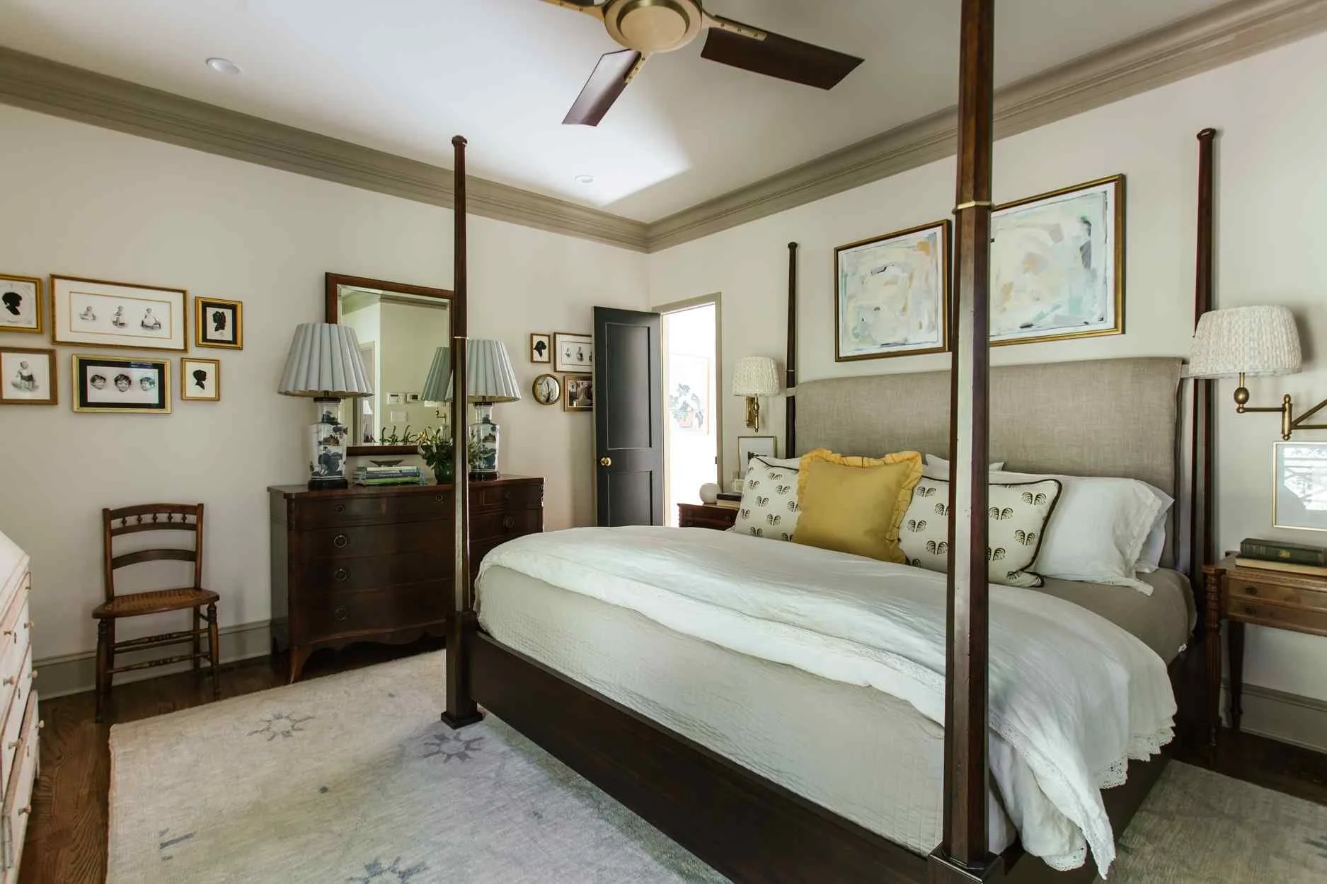   This beautiful home designed by The Misfit House and photographed by Kristin Karch Photography - love the primary bedroom with four poster bed