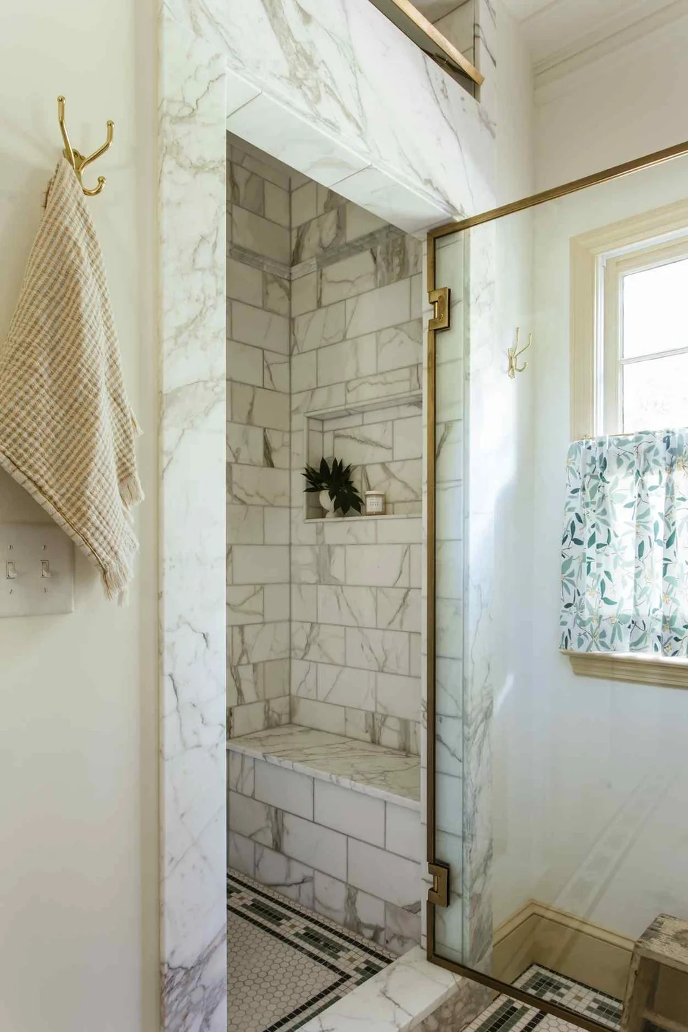 Classic interiors balance comfort with elegance, familiar with fresh, and functionality with beauty. Small touch a fabulous brass range hood, a stack of antique books or a personal collection that is uniquely yours can have a big impact.  This beautiful home designed by The Misfit House and photographed by Kristin Karch Photography