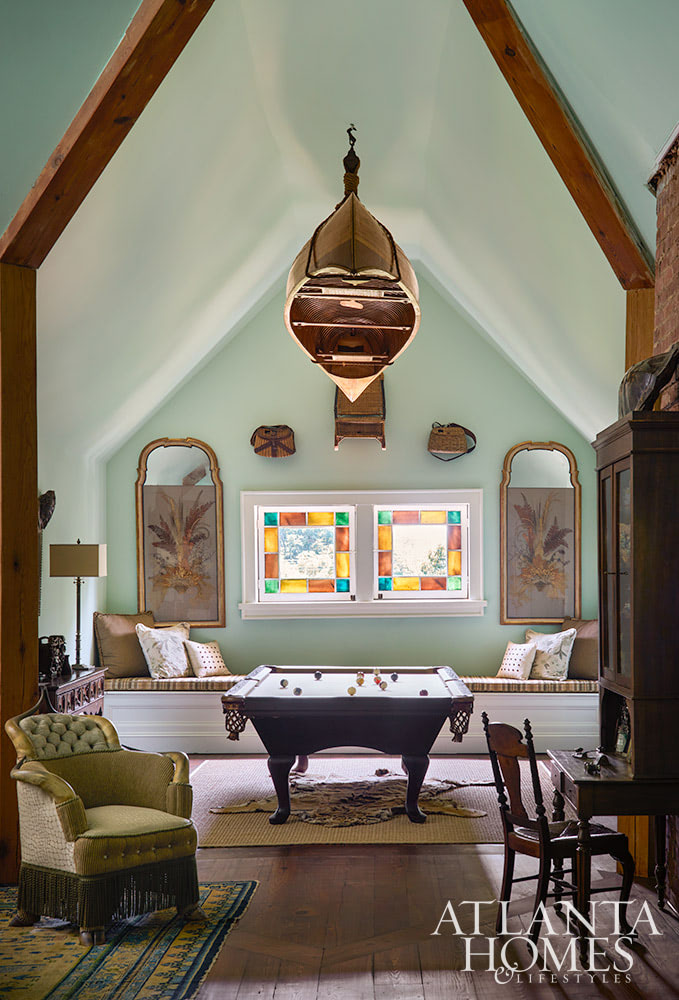 Dan Belman and Randy Korando, the owners of Atlanta's iconic Boxwoods Gardens & Gifts, transformed a historic Queen Anne home using maximalist decor ideas we love. In this style, texture, pattern, and color combine to create this "more is more" approach. From the stunning architectural details to the well-placed accessories, every element is perfection, inside and out!