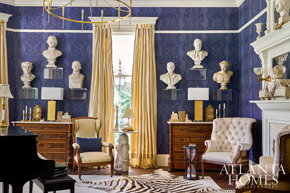Dan Belman and Randy Korando, the owners of Atlanta's iconic Boxwoods Gardens & Gifts, transformed a historic Queen Anne home using maximalist decor ideas we love. In this style, texture, pattern, and color combine to create this "more is more" approach. From the stunning architectural details to the well-placed accessories, every element is perfection, inside and out!
