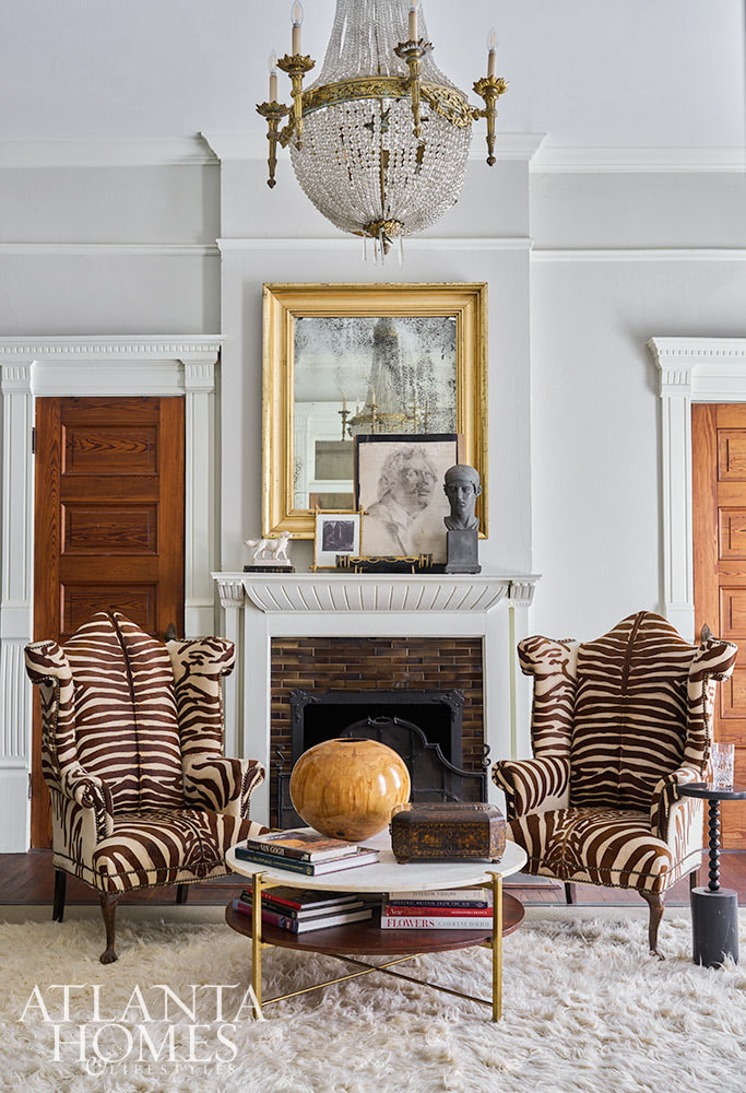 Dan Belman and Randy Korando, the owners of Atlanta's iconic Boxwoods Gardens & Gifts, transformed a historic Queen Anne home using maximalist decor ideas we love. In this style, texture, pattern, and color combine to create this "more is more" approach. From the stunning architectural details to the well-placed accessories, every element is perfection, inside and out!