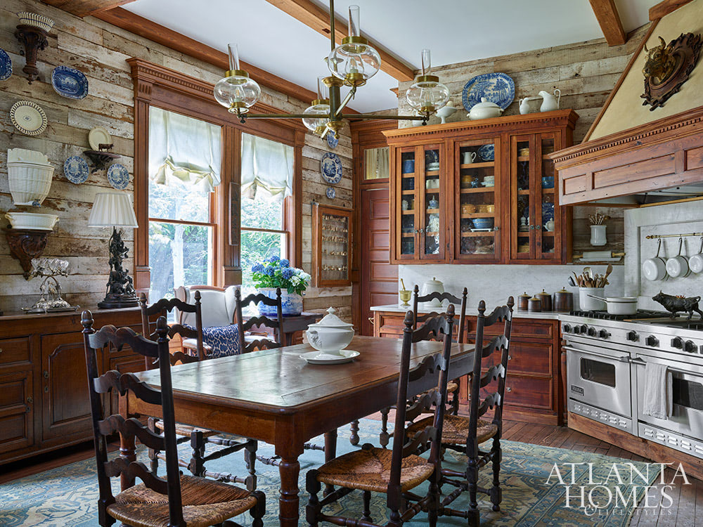 Dan Belman and Randy Korando, the owners of Atlanta's iconic Boxwoods Gardens & Gifts, transformed a historic Queen Anne home using maximalist decor ideas we love. In this style, texture, pattern, and color combine to create this "more is more" approach. From the stunning architectural details to the well-placed accessories, every element is perfection, inside and out!