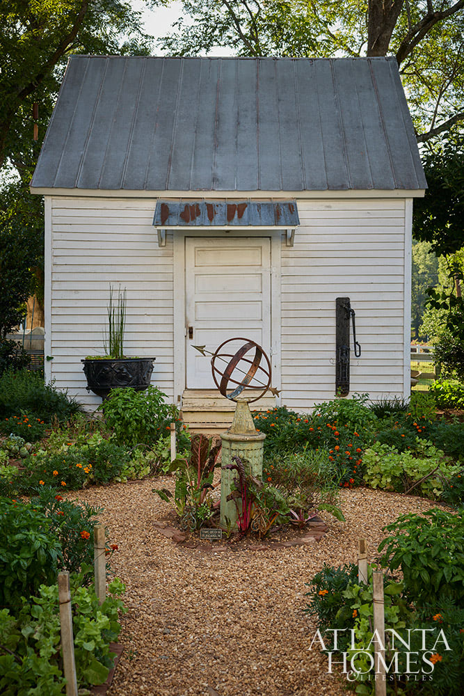 Dan Belman and Randy Korando, the owners of Atlanta's iconic Boxwoods Gardens & Gifts, transformed a historic Queen Anne home using maximalist decor ideas we love. In this style, texture, pattern, and color combine to create this "more is more" approach. From the stunning architectural details to the well-placed accessories, every element is perfection, inside and out!