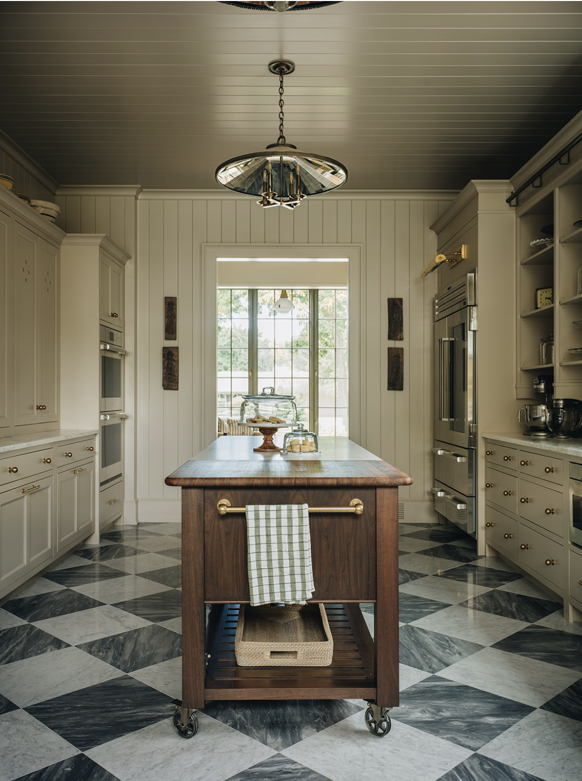 This gorgeous home with elegant interiors by Jean Stoffer Design and photographed by Stoffer Photography Interiors is the perfect combination of modern and traditional and hits all the high notes when it comes to style. So take a look around. You're welcome to stay as long as you like!