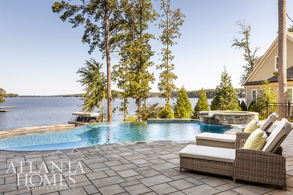 Clean, crisp, and luxuriously inviting with stunning interiors, we adore this waterfront oasis designed by Sandy Becke! Jeff Herr Photography