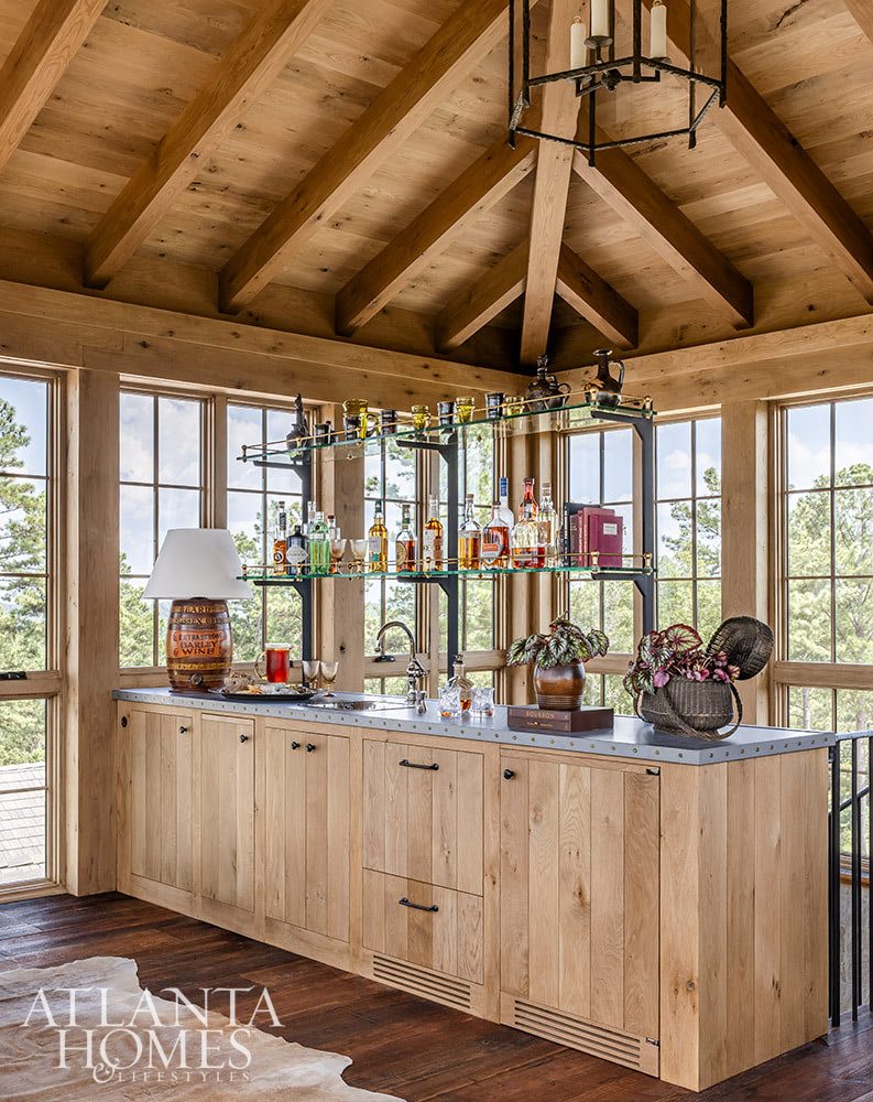 Favorite designers, Beth Webb  in collaboration with architect Heyward Russell Studio, inspire us at every turn - stained kitchen with island and wood beams