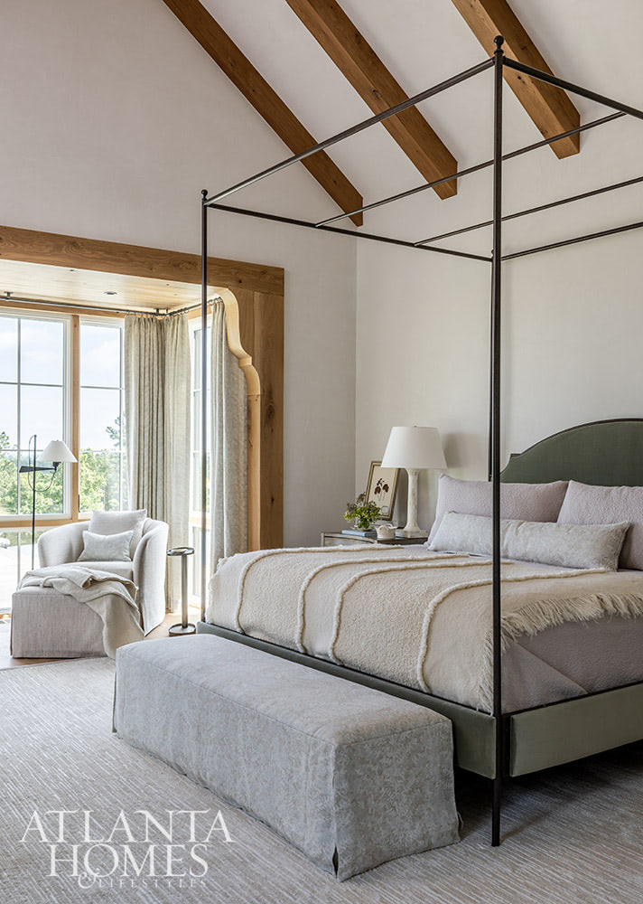 Favorite designers, Beth Webb  in collaboration with architect Heyward Russell Studio, inspire us at every turn - 4 poster bed in bedroom with wood beams
