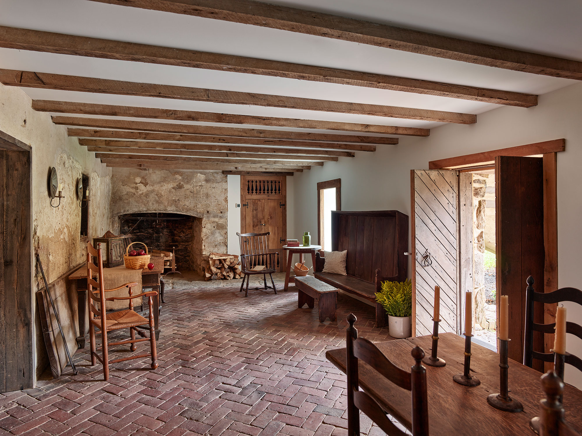 As the holidays come to an end, we hope you can steal away for a moment to take a peek at this gorgeous Archer & Buchanan Architecture designed home, photographed by Jeffrey Totaro and built by Griffiths Construction, Inc. This thoughtful restoration created a peaceful, calming home–with incredible views–that just might lend you a moment of serenity. Archer & Buchanan created a space that truly feels like a zen retreat, the perfect place to start a stress-free new year! Their designs are grounded in the past, designed for the present, and intended to be gorgeous and functional for family and friends to enjoy for years to come. Love the windsor chairs in the farmhouse dining room