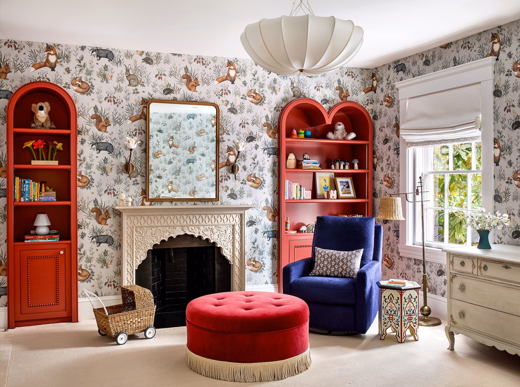Rich, earthy colors, layered textures and rooms that tell a story are central to 2026 interior design trends. This historic Georgetown row house designed by Zoe Feldman has us daydreaming about adding a few of these trends to our own homes. Stacy Zarin Goldberg Photography = red bookcases
