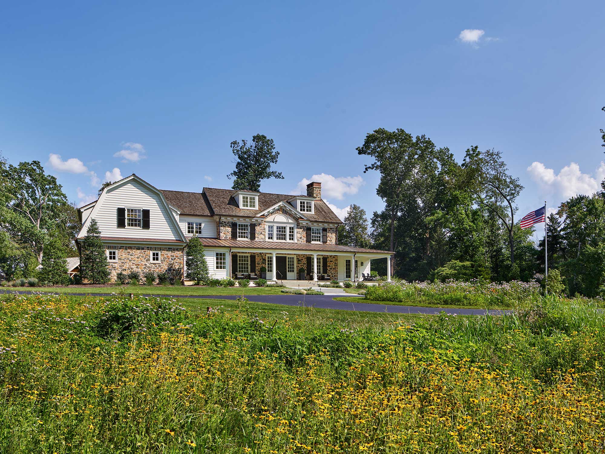 Architectural details of a home from Archer & Buchanan- the beautiful - love a stone exterior with a dutch colonial home