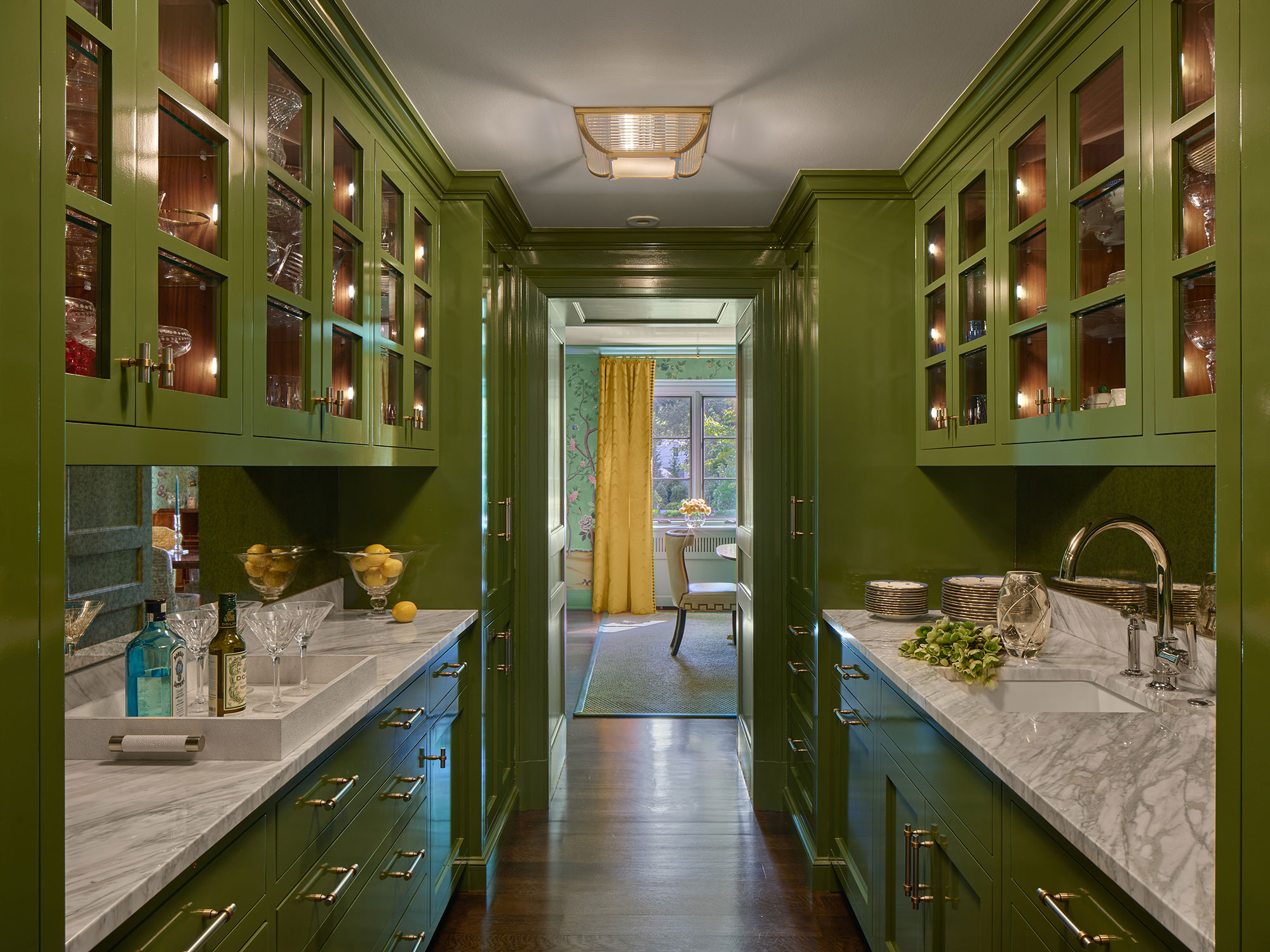 Archer & Buchanan Architects Photography: Halkin | Mason Photography - Who doesn't love a green butler's pantry with marble countertops