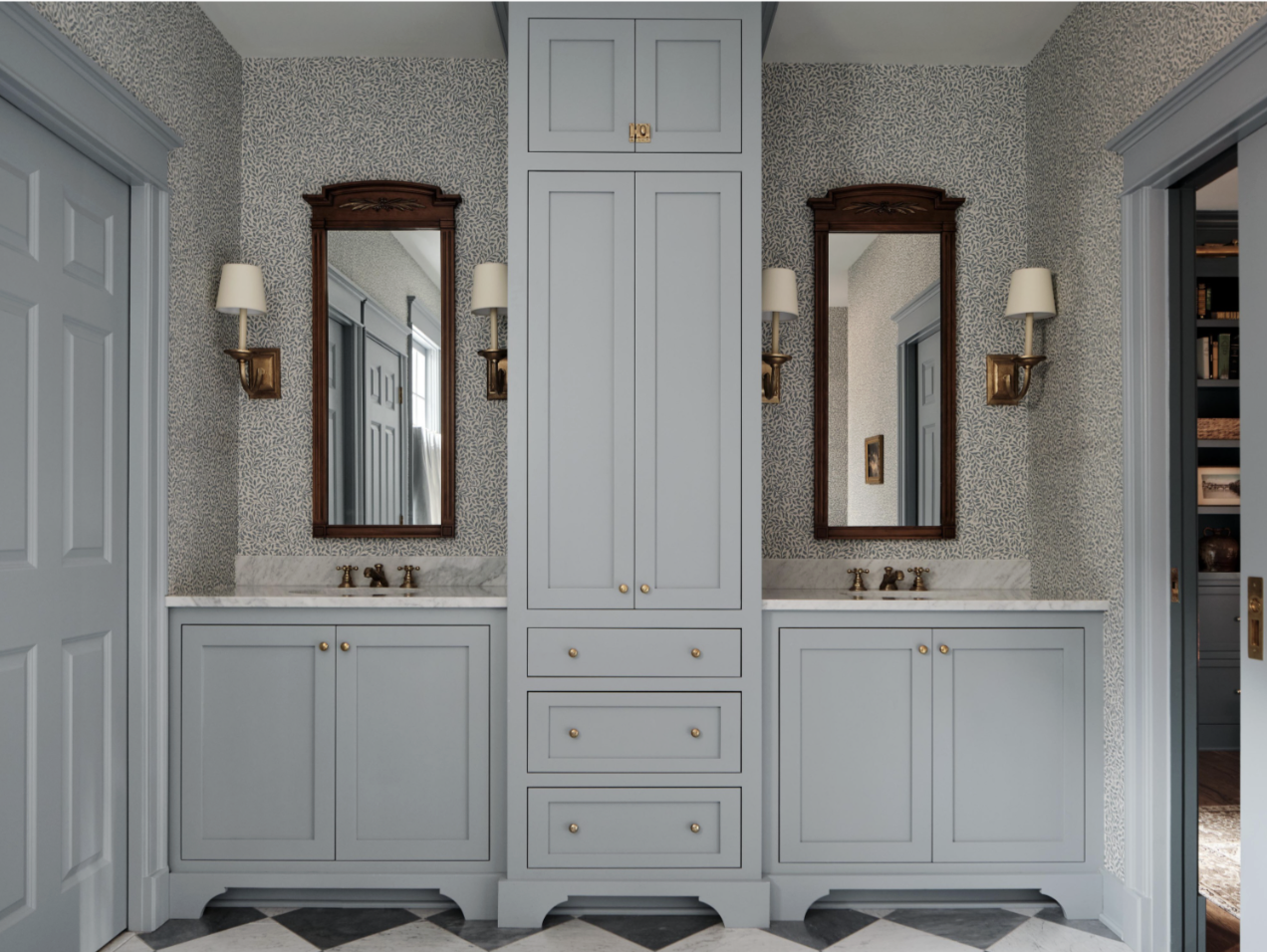 Step inside this Nashville home by Sabbe Interior Design, where timeless interior design meets family-friendly living. Joseph G. Bradshaw Photography - serene primary bath in beautiful shade of blue