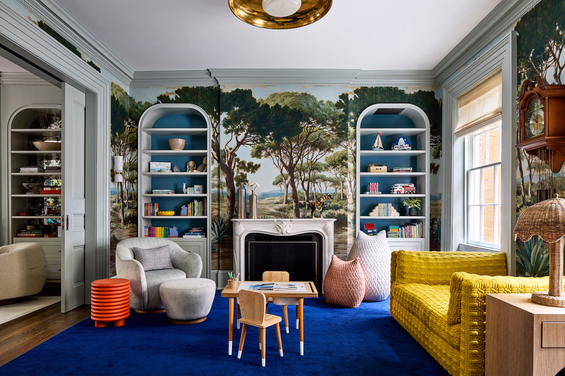 Rich, earthy colors, layered textures and rooms that tell a story are central to 2026 interior design trends. This historic Georgetown row house designed by Zoe Feldman has us daydreaming about adding a few of these trends to our own homes. Stacy Zarin Goldberg Photography yellow sofa