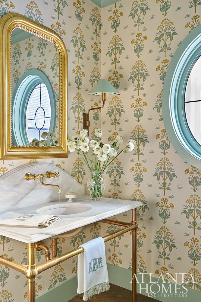 SOURCE; Atlanta Homes & Lifestyles INTERIOR DESIGN  Virginia Nocharli Design  ARCHITECT: Greg Busch Architects BUILDER Rhett Bonner, Bonner Buchanan  LANDSCAPE ARCHITECT  Richard Anderson Landscape Architect pretty powder room with beautiful wallpaper and brass and marble console sink