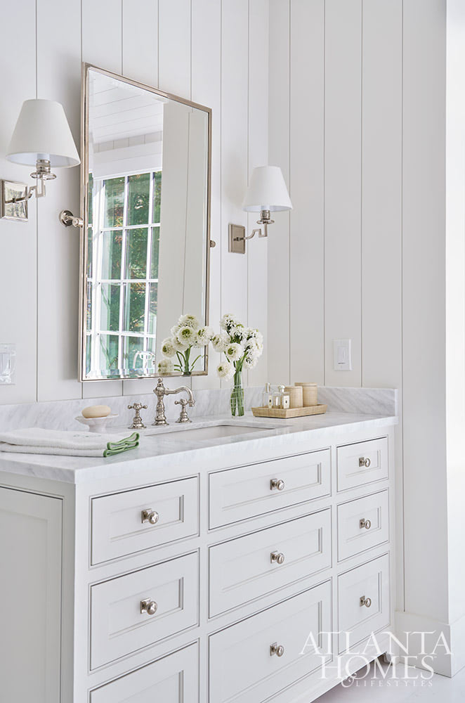 SOURCE; Atlanta Homes & Lifestyles INTERIOR DESIGN  Virginia Nocharli Design  ARCHITECT: Greg Busch Architects BUILDER Rhett Bonner, Bonner Buchanan  LANDSCAPE ARCHITECT  Richard Anderson Landscape Architect - paneled white walls in the bathroom with chrome hardware