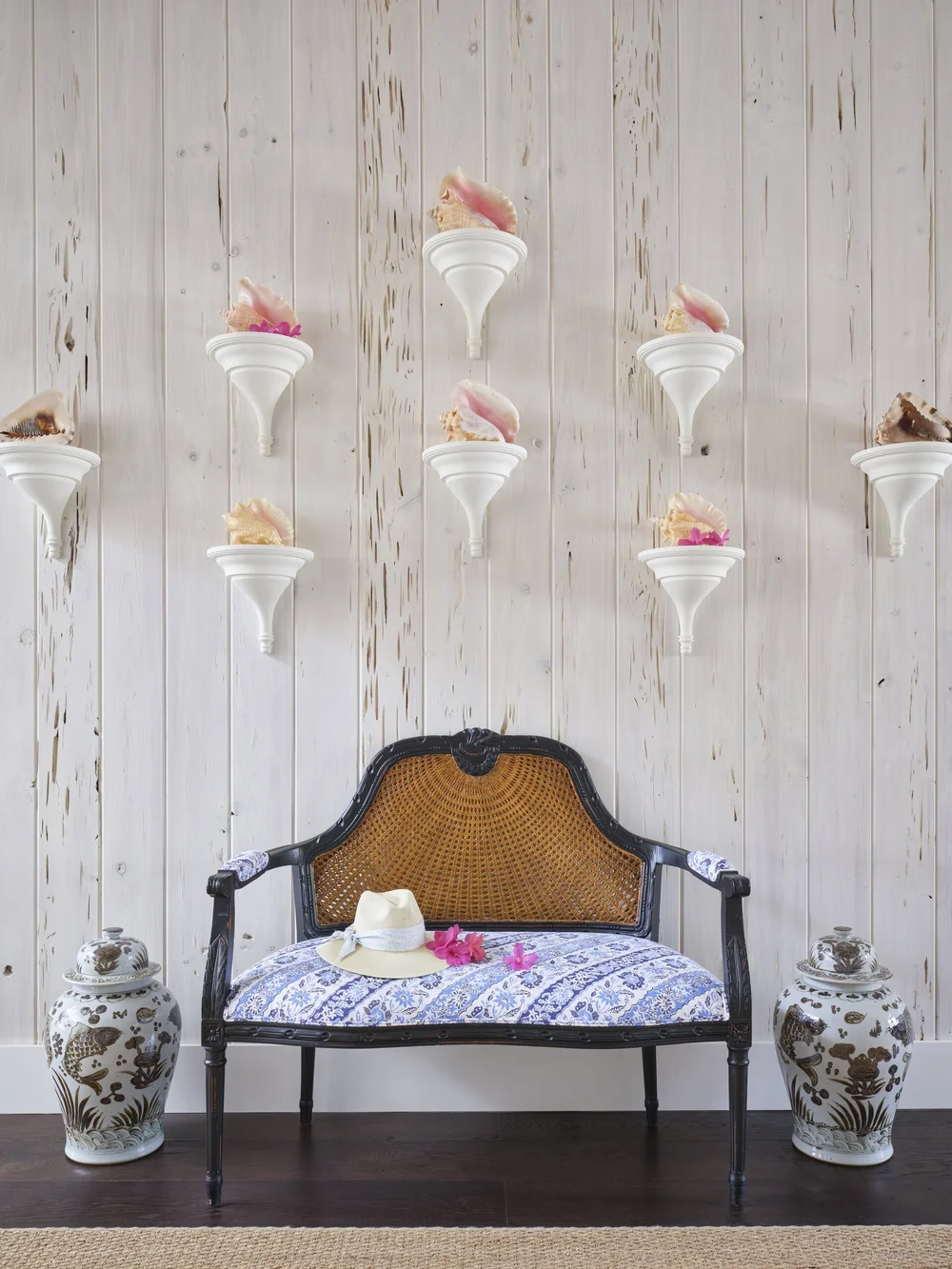 We hope you are having a great week–and are in the mood for touring a one-of-a-kind home designed by the talented Kara Miller and beautifully photographed by Brantley Photography. Neutral enough to be calm, textured enough to be interesting, and layered into complete coziness, this perfectly styled home is ideal for friends and family. wall shelf with shells