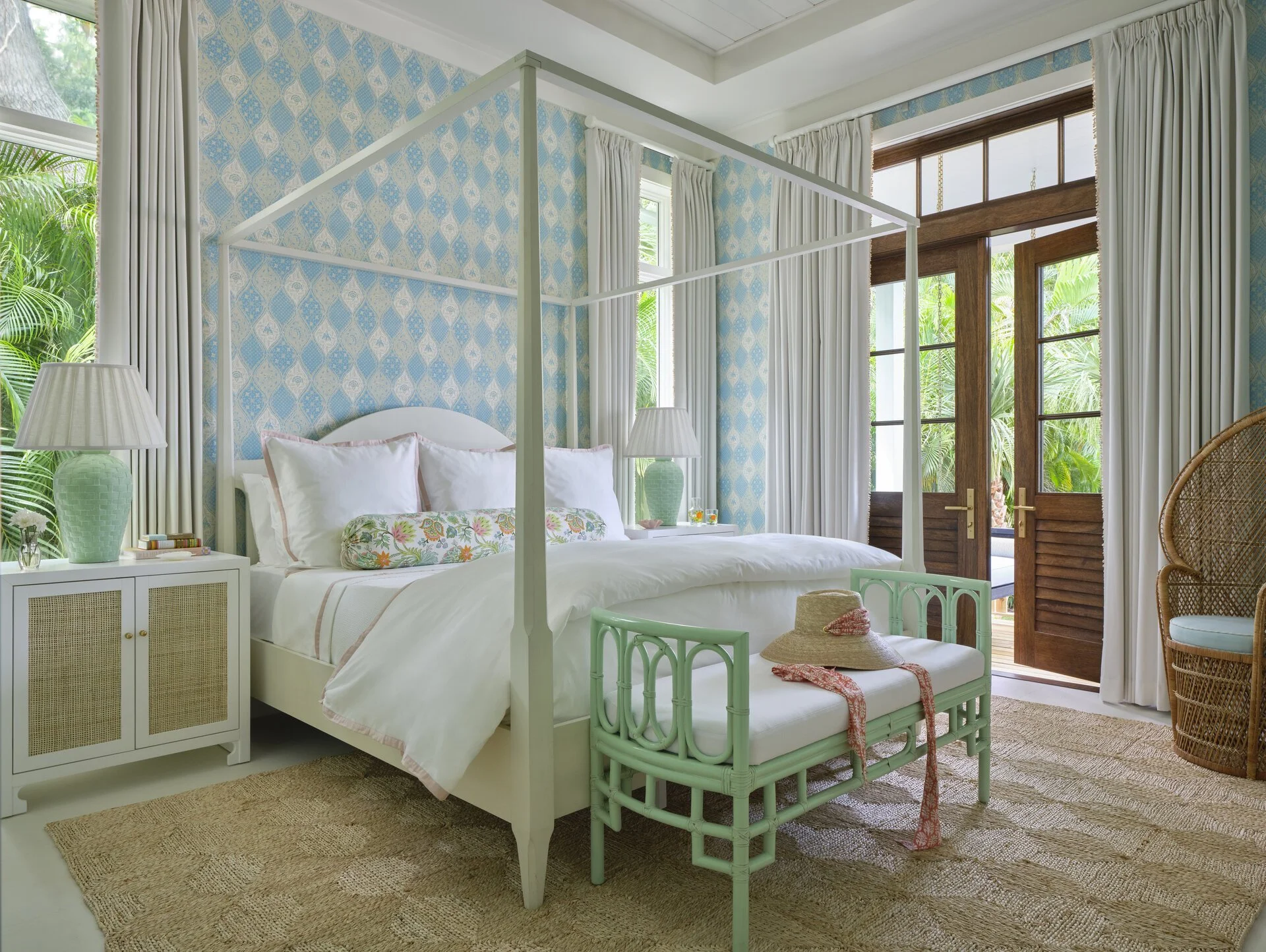 We hope you are having a great week–and are in the mood for touring a one-of-a-kind home designed by the talented Kara Miller and beautifully photographed by Brantley Photography. Neutral enough to be calm, textured enough to be interesting, and layered into complete coziness, this home is ideal for friends and family.Beautiful blue and white bedroom with canopy bed and green bench