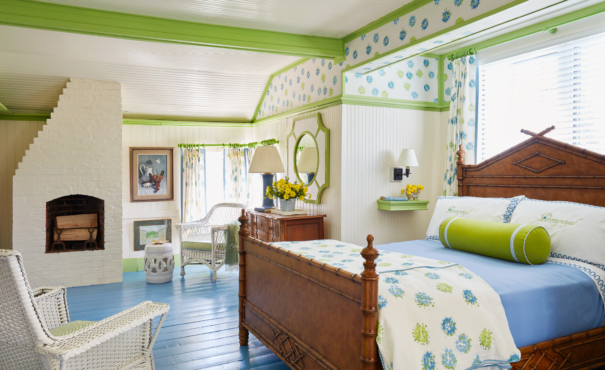 If so, you’re in for a treat today. Todays historic Catskill cottage tour designed by the talented team at Amanda Reynal Interiors is a refuge from the fast pace of modern life.   Charming and livable with lush surroundings and even lusher interiors, this home will make you feel a world away without ever leaving your living room. Thomas Loof Photography - green and white bedroom with light blue painted floors