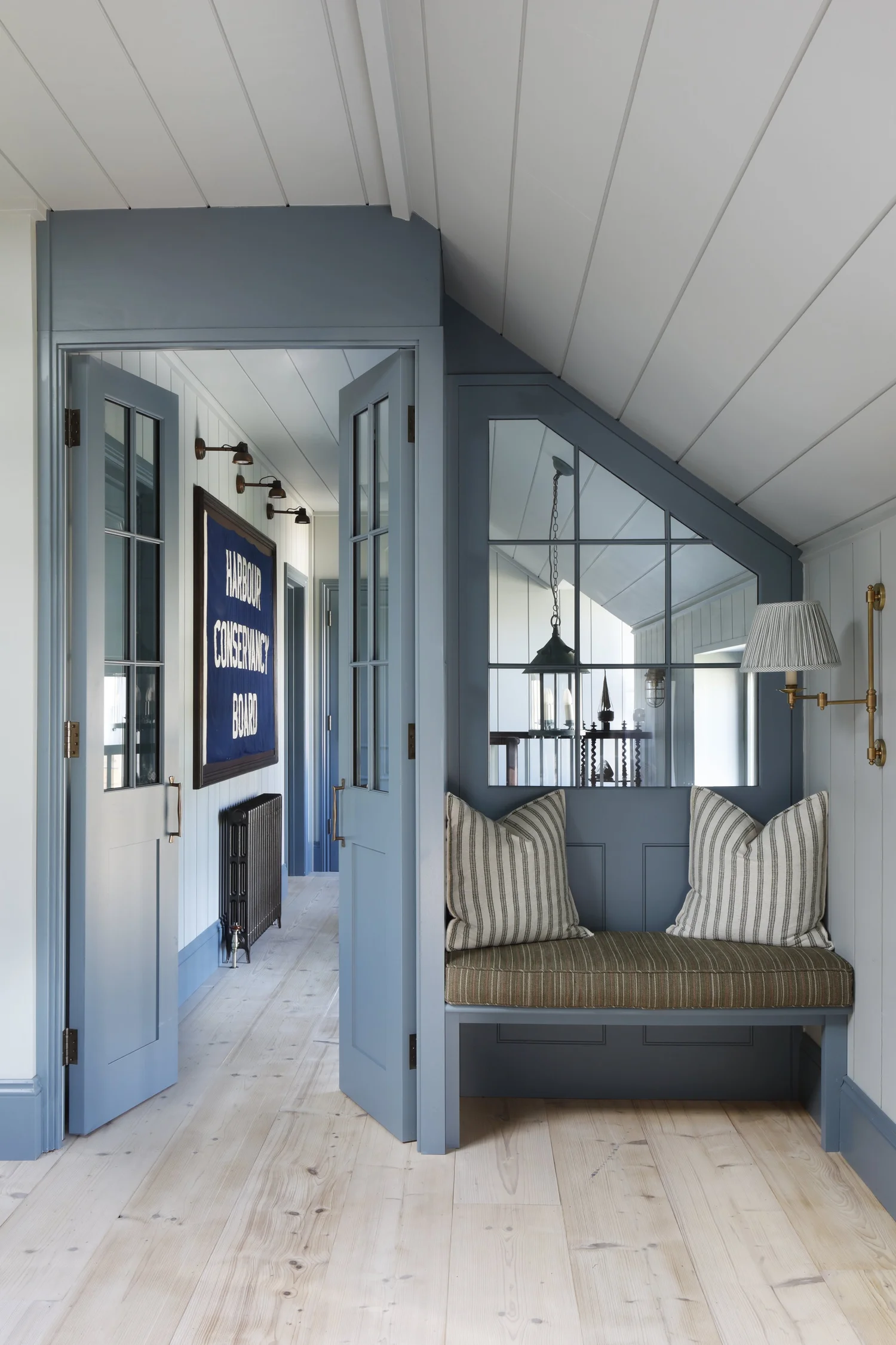 This former fisherman's house, imagined as a sea captain's home, is totally unique, quietly luxurious, and unforgettably chic. Ham Interiors - Alexander James Photography