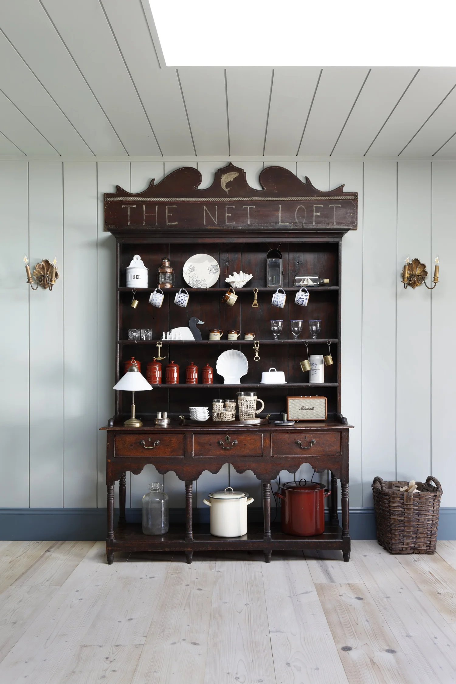 This former fisherman's house, imagined as a sea captain's home, is totally unique, quietly luxurious, and unforgettably chic. Ham Interiors - Alexander James Photography