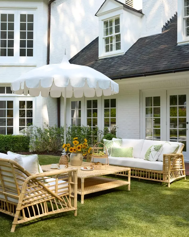 Take a look at favorite inspiration from Serena & Lily! Love the wicker lantern over the dining table with wicker chairs - love the outdoor area with a white umbrella with green trim on the scallops