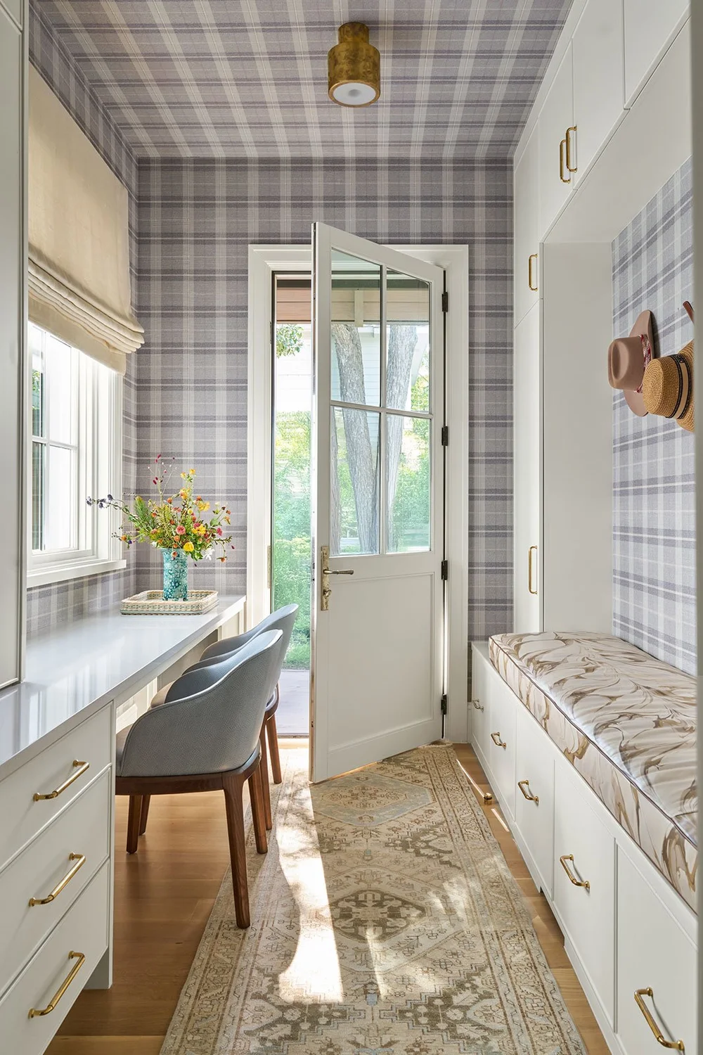  Where stunning moldings and architectural details live comfortably with casual rooms. Mary Beth Wagner Interior Design - Nathan Schroder Photography - plaid wallpaper in mudroom