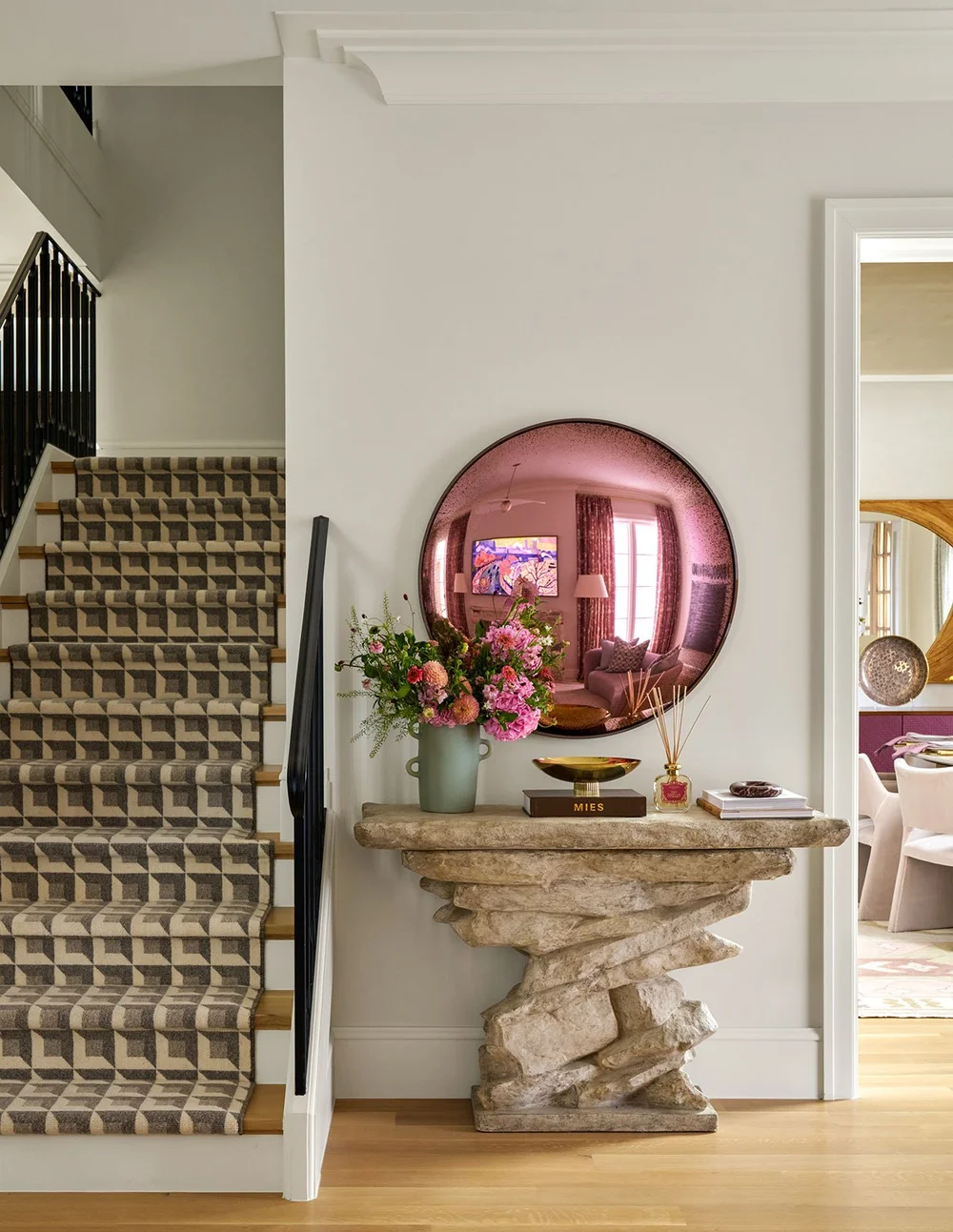 In a world full of minimalism and clean lines, traditional design is making a quiet comeback. It’s the perfect mix of classic touches and updated details, well-suited for family living and entertaining. Where stunning moldings and architectural details live comfortably with more casual room. Mary Beth Wagner Interior Design - Nathan Schroder Photography - beautiful runner on staircase in foyer