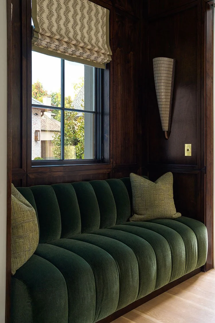 In a world full of minimalism and clean lines, traditional design is making a quiet comeback. It’s the perfect mix of classic touches and updated details, well-suited for family living and entertaining. Where stunning moldings and architectural details live comfortably with more casual room. Mary Beth Wagner Interior Design - Nathan Schroder Photography - velvet tufted sofa