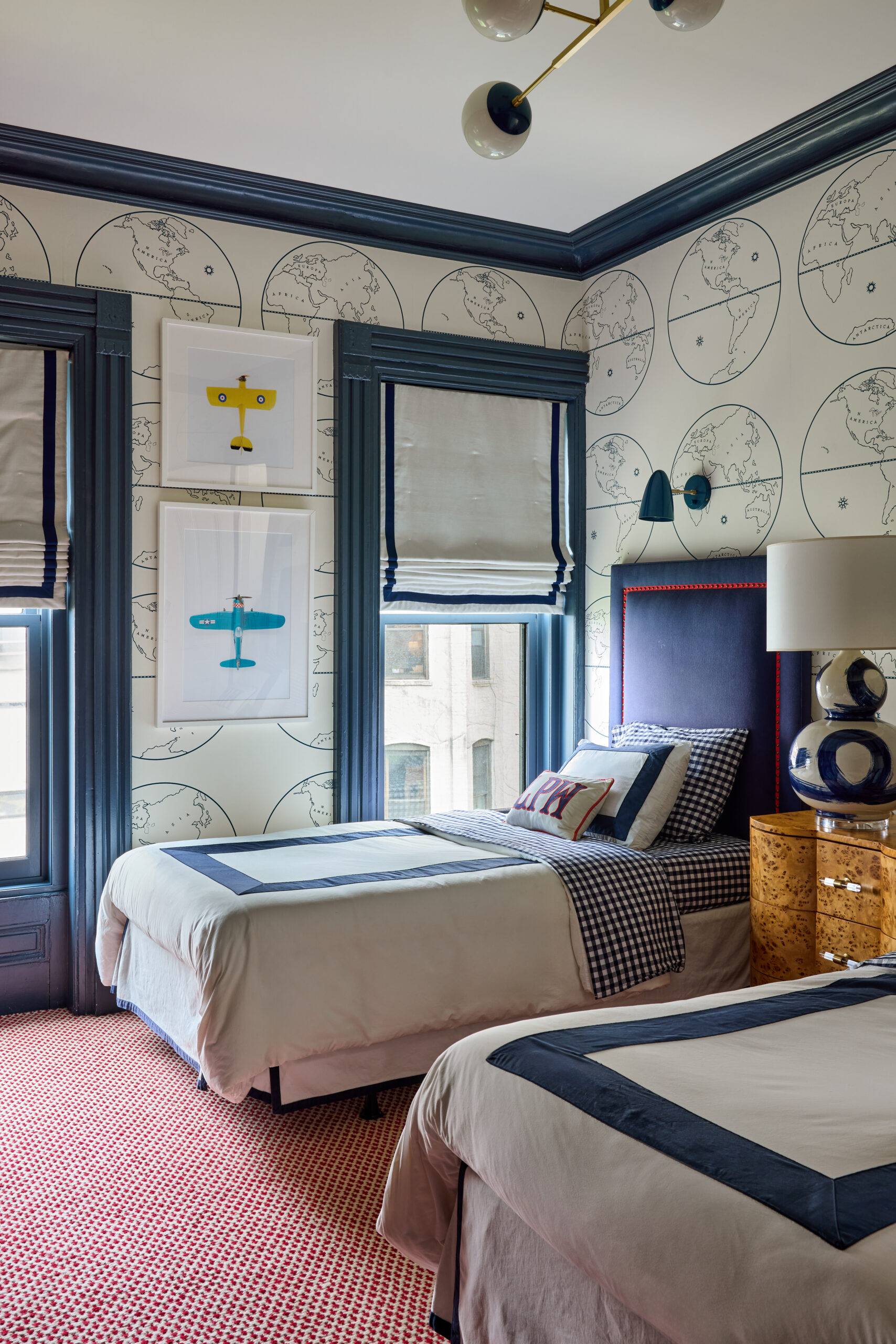 Kristen Francis Photography | Frances Bailey Stylist - charming boys bedroom with map wallpaper and airplane art