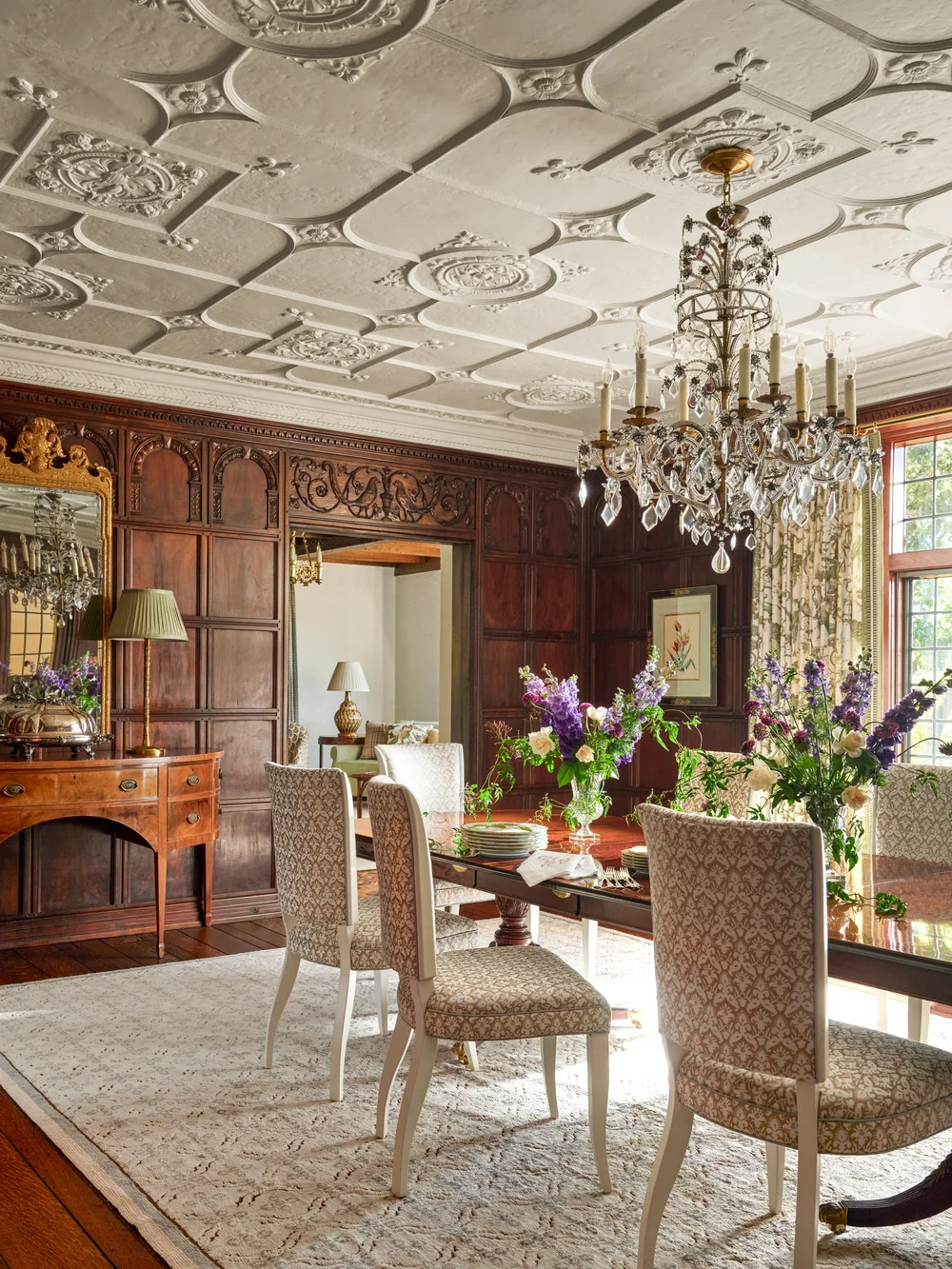 You'll love how Jenkins Interiors beautifully blends old and new in this timeless home, preserving history while updating it for modern life. The architectural details of this ceiling in the dining room are incredible - love the crystal chandelier over the dining table - Stephen Karlish Photography