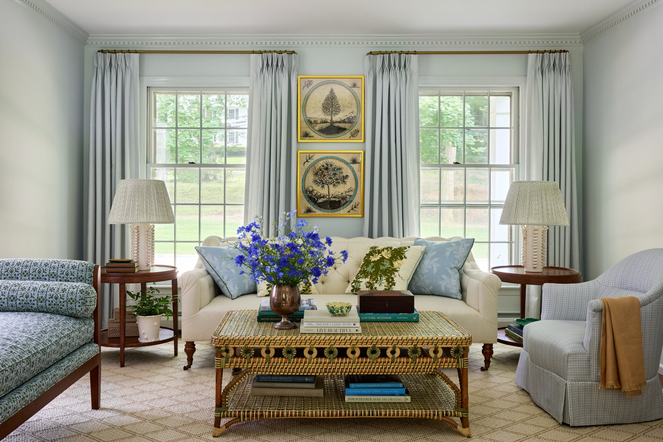 Kristen Francis Photography | Matthew Gleason Stylish - living room in blue and white with artwork from Mary McGuire in this beautiful interior design 