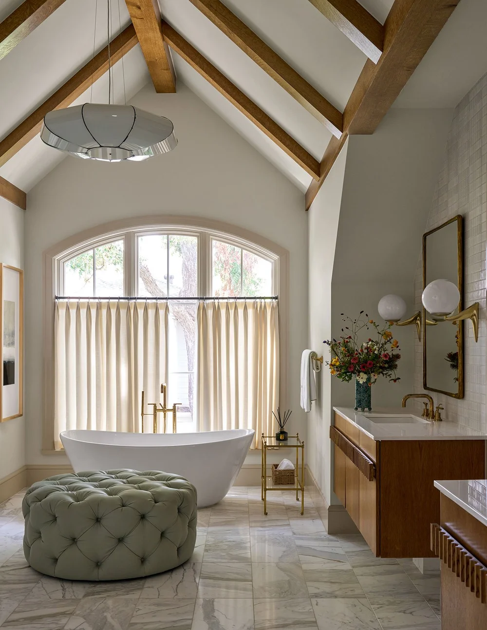 In a world full of minimalism and clean lines, traditional design is making a quiet comeback. It’s the perfect mix of classic touches and updated details, well-suited for family living and entertaining. Where stunning moldings and architectural details live comfortably with more casual room. Mary Beth Wagner Interior Design - Nathan Schroder Photography - cathedral ceiling with wood beams in bathroom