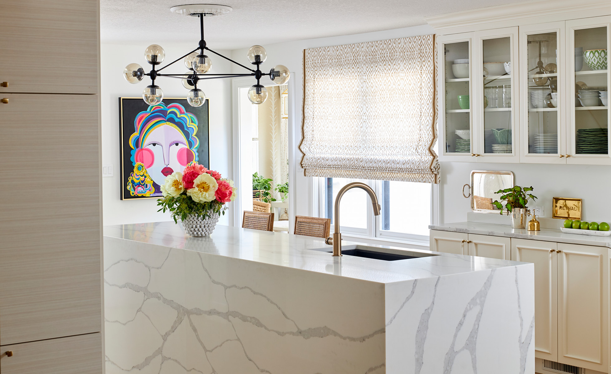 Step inside this home from Amanda Reynal, and then take another peek so you don't miss a single detail! - Adam Albright PHotography - love the pop of color in the kitchen with the face art