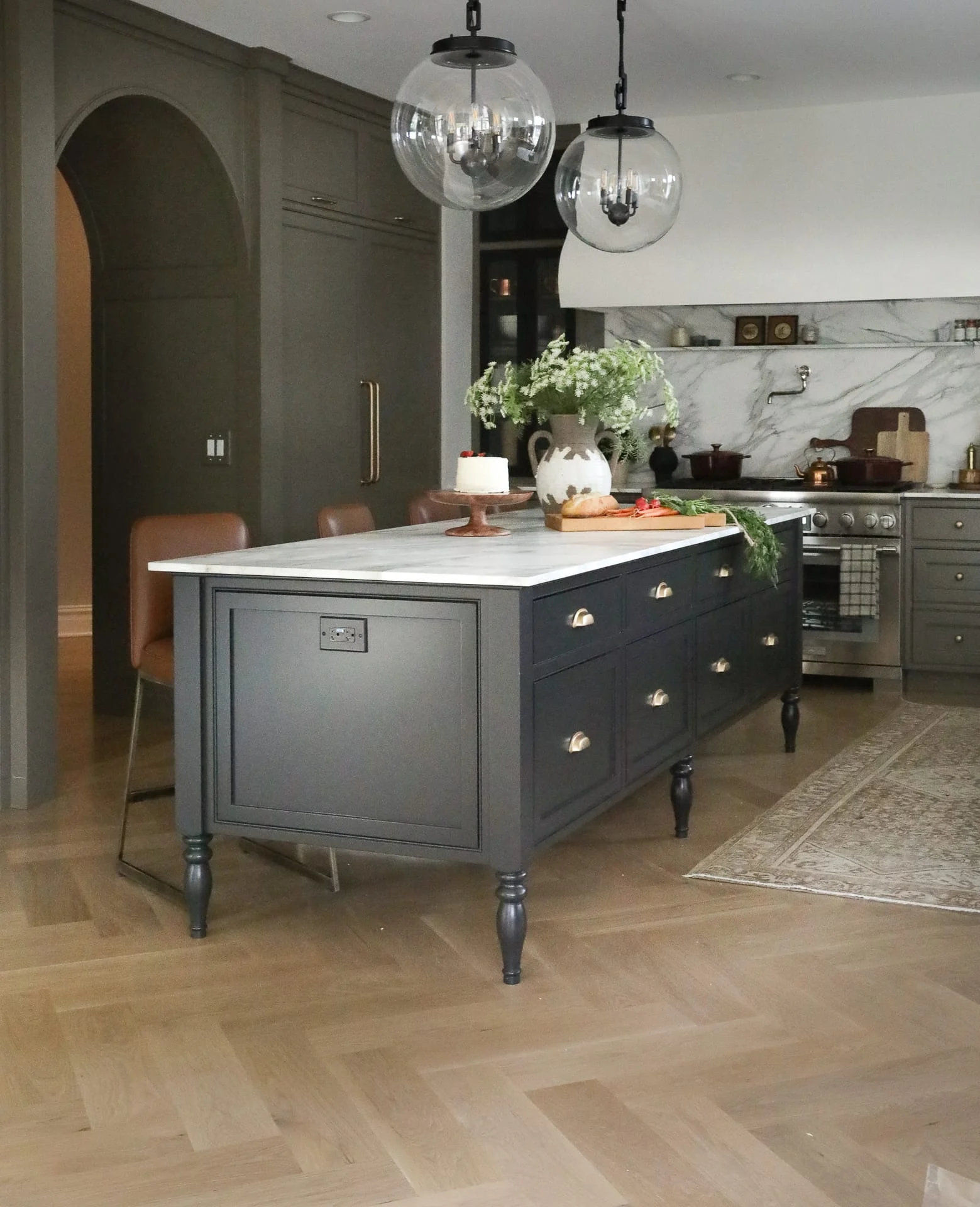 For many years, all white kitchens were the choice for designers, and color and texture were added with decor and table settings. White kitchens are not going away, but the shift towards warmer tones is all the rage, as shown in these fabulous looks from Park and Oak Design.