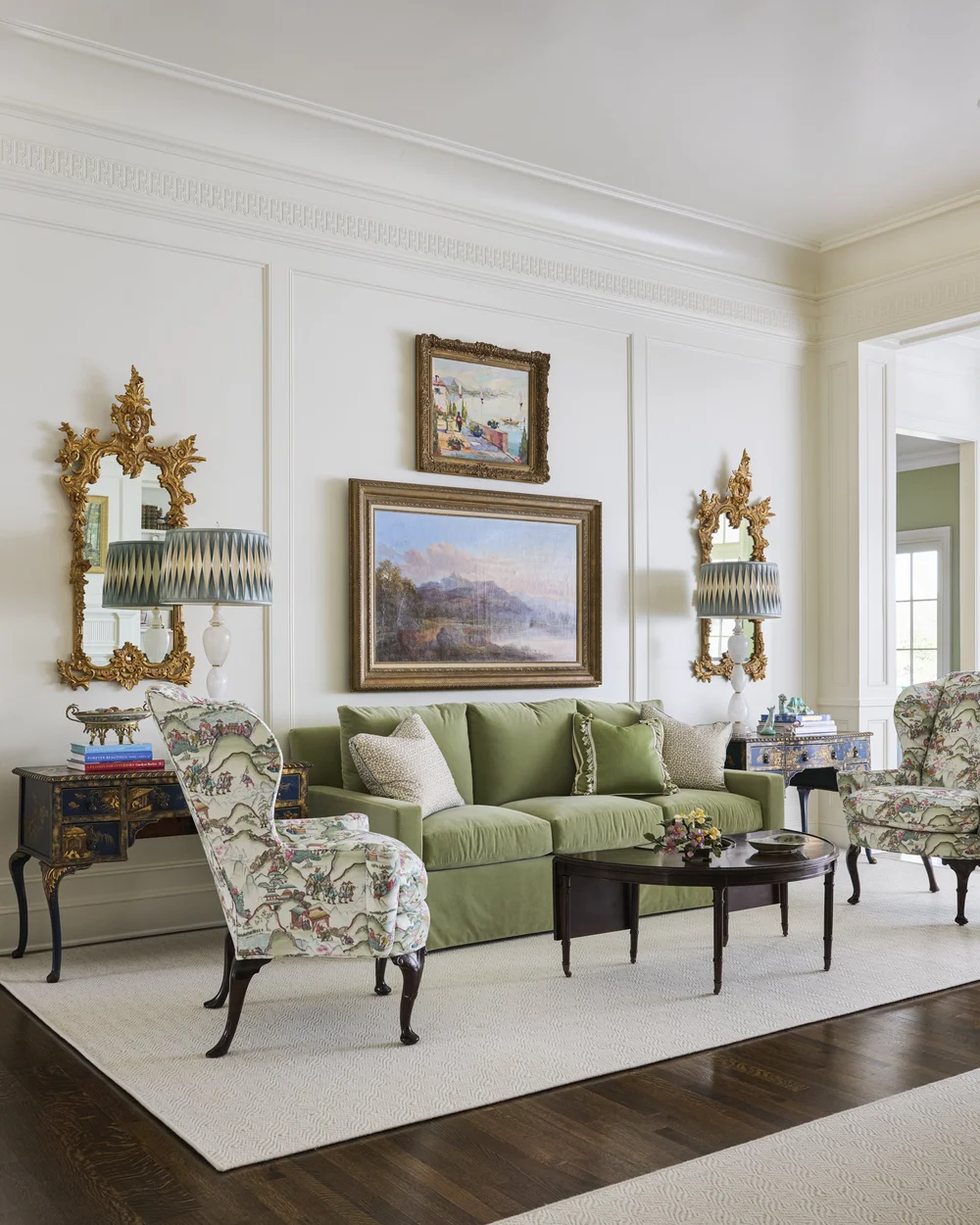 Take a look at a few collected living rooms that become experiences making us want to linger just a little longer. Take a look at favorites! Jenkins Interiors | K8 Creative Photography - love the green velvet sofa with a pair of mirrors over end tables