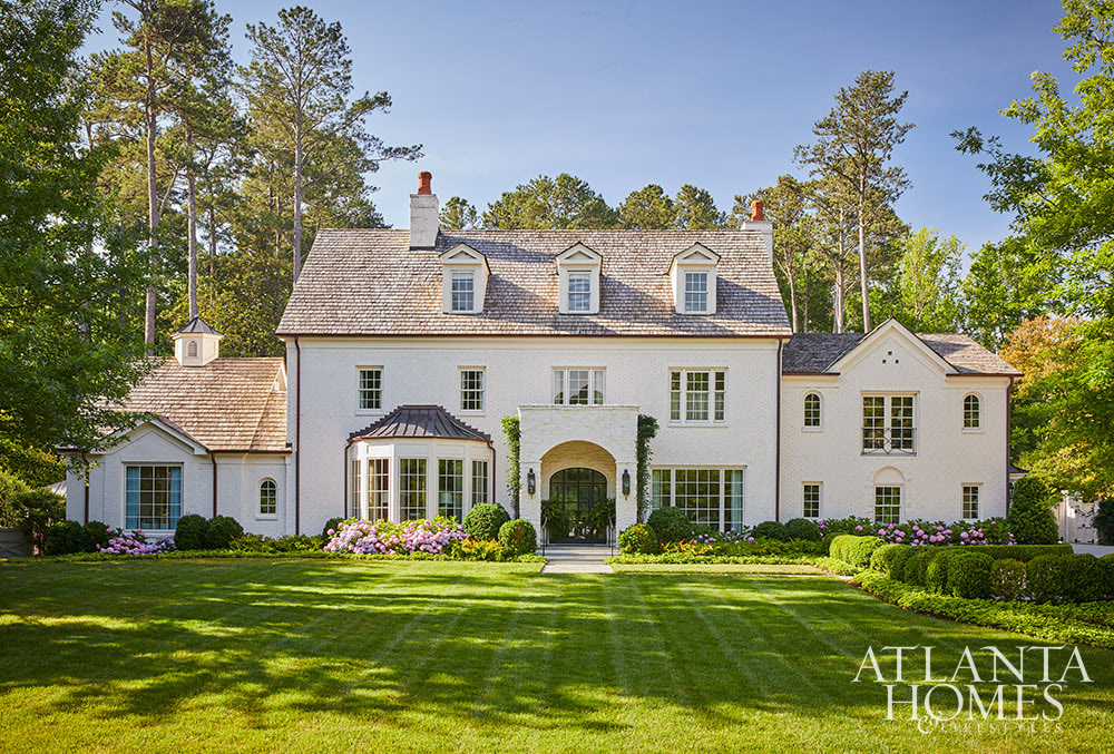 A Beautiful Traditional Home Inside and Out - Source Atlanta Homes & Lifestyles | Interior Design by Andrea Henzlik Design  | Architect Greg Busch Architects | Photographed by Emily Followill | Styled by Eleanor Roper  | Landscape Architect Carson McElheney, Hamilton Land Services Inc | Builder Roger Balko - love the white painted brick on the 2 story traditional with 3 dormers