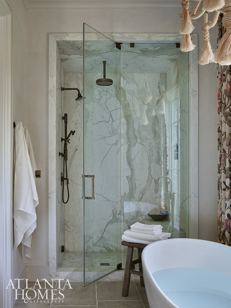 Source Atlanta Homes & Lifestyles | Interior Design by Andrea Henzlik Design  | Architect Greg Busch Architects | Photographed by Emily Followill | Styled by Eleanor Roper  | Landscape Architect Carson McElheney, Hamilton Land Services Inc | Builder Roger Balko - beautiful bathroom with bronze fixtures