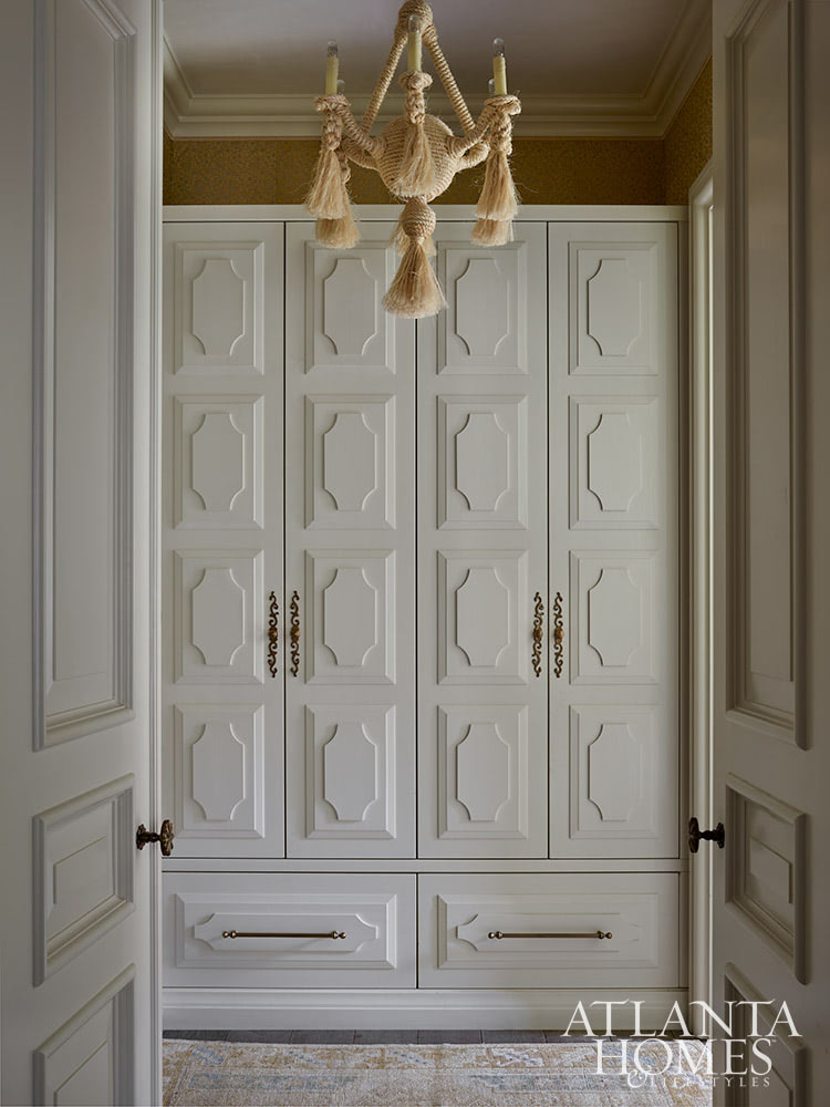 Source Atlanta Homes & Lifestyles | Interior Design by Andrea Henzlik Design  | Architect Greg Busch Architects | Photographed by Emily Followill | Styled by Eleanor Roper  | Landscape Architect Carson McElheney, Hamilton Land Services Inc | Builder Roger Balko - beautiful architecture on the doors of the mudroom