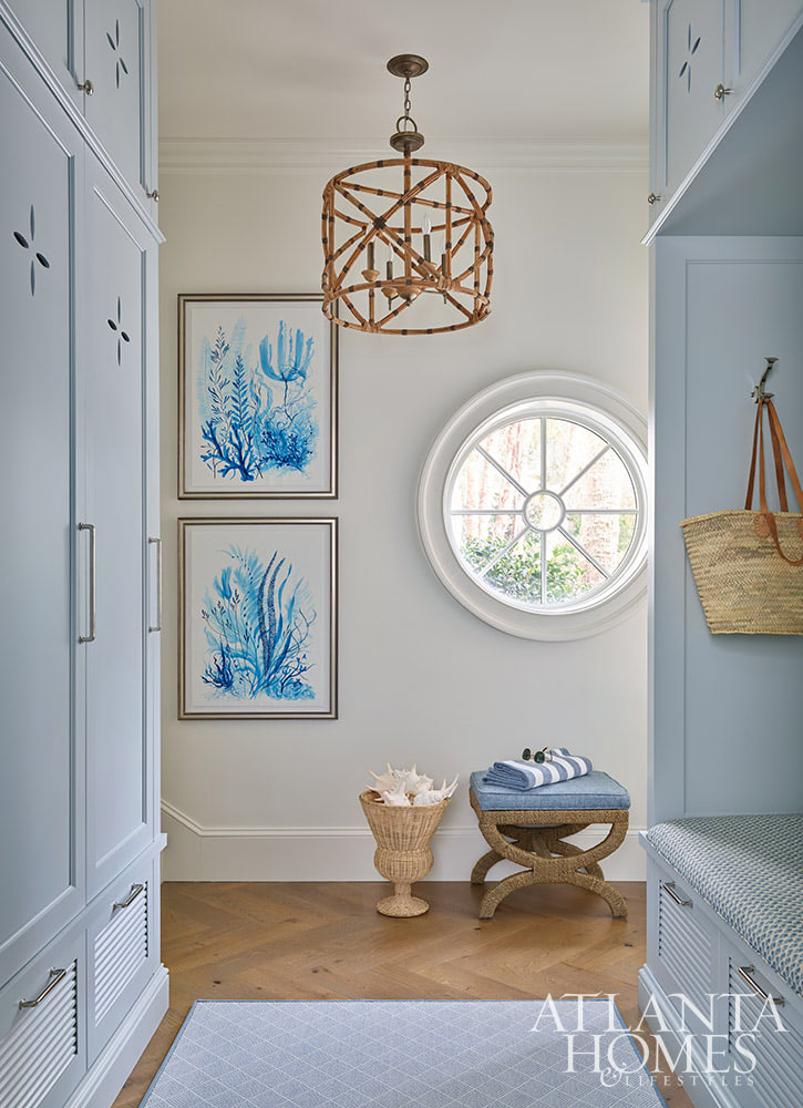 Heather Dewberry, one of our favorite designers,  Architect Josh Youngner,  Builder Matthew McHale, Ramsey McHale, and Landscape Architect Sea Island Landscape, and Stylist Jimmie Henslee in this months Atlanta Home & Lifestyle, make designing a coastal oasis look effortless. Love the blue and white mudroom with the Dutch door and palm tree wallpaper and Currey and Co bamboo light fixture
