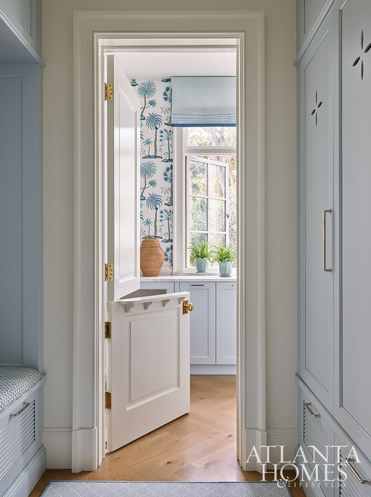 Heather Dewberry, one of our favorite designers,  Architect Josh Youngner,  Builder Matthew McHale, Ramsey McHale, and Landscape Architect Sea Island Landscape, and Stylist Jimmie Henslee in this months Atlanta Home & Lifestyle, make designing a coastal oasis look effortless. Love the blue and white mudroom with the Dutch door and palm tree wallpaper