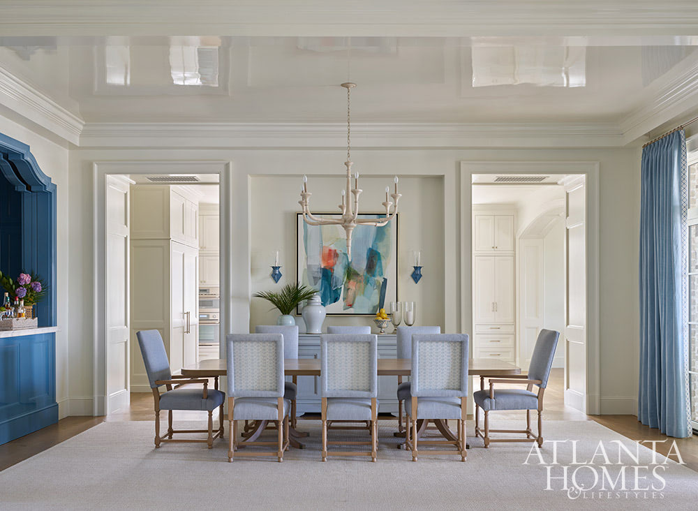 Heather Dewberry, one of our favorite designers,  Architect Josh Youngner,  Builder Matthew McHale, Ramsey McHale, and Landscape Architect Sea Island Landscape, and Stylist Jimmie Henslee in this months Atlanta Home & Lifestyle, make designing a coastal oasis look effortless, as evidenced by this gorgeous Sea Island Home. Dining room with lacquered ceiling in blue and white and abstract art