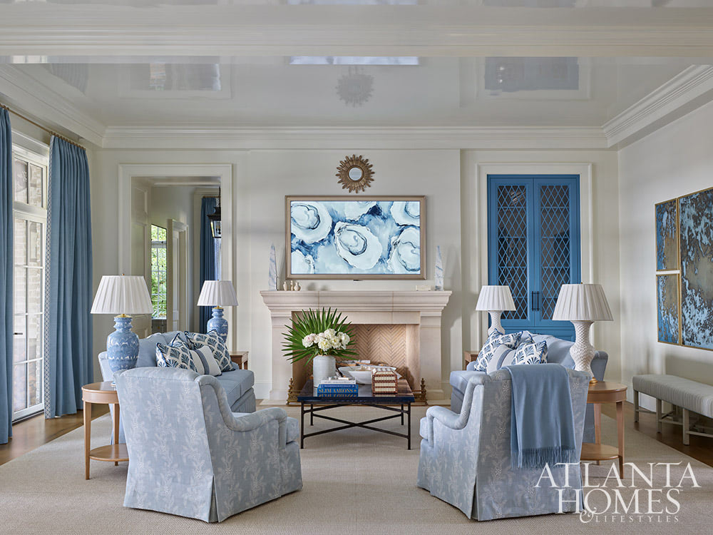 Heather Dewberry, one of our favorite designers,  Architect Josh Youngner,  Builder Matthew McHale, Ramsey McHale, and Landscape Architect Sea Island Landscape, and Stylist Jimmie Henslee in this months Atlanta Home & Lifestyle, make designing a coastal oasis look effortless, as evidenced by this gorgeous Sea Island Home. Family room with a framed hanging tv