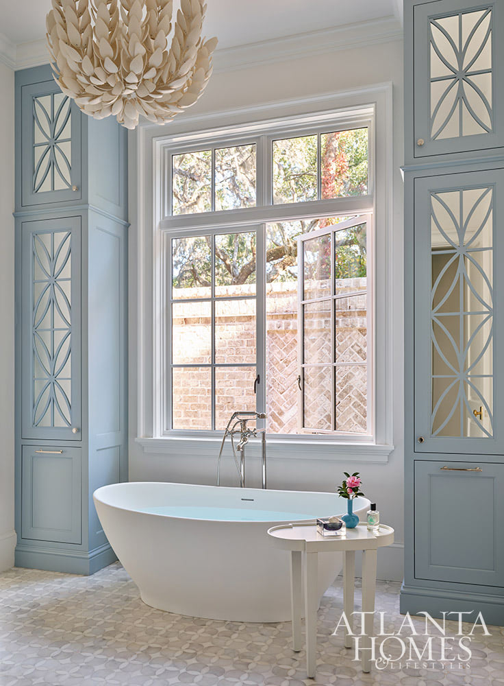 Heather Dewberry, one of our favorite designers,  Architect Josh Youngner,  Builder Matthew McHale, Ramsey McHale, and Landscape Architect Sea Island Landscape, and Stylist Jimmie Henslee in this months Atlanta Home & Lifestyle, make designing a coastal oasis look effortless. Love the blue and white bathroom with the Palacek light fixture and freestanding tub