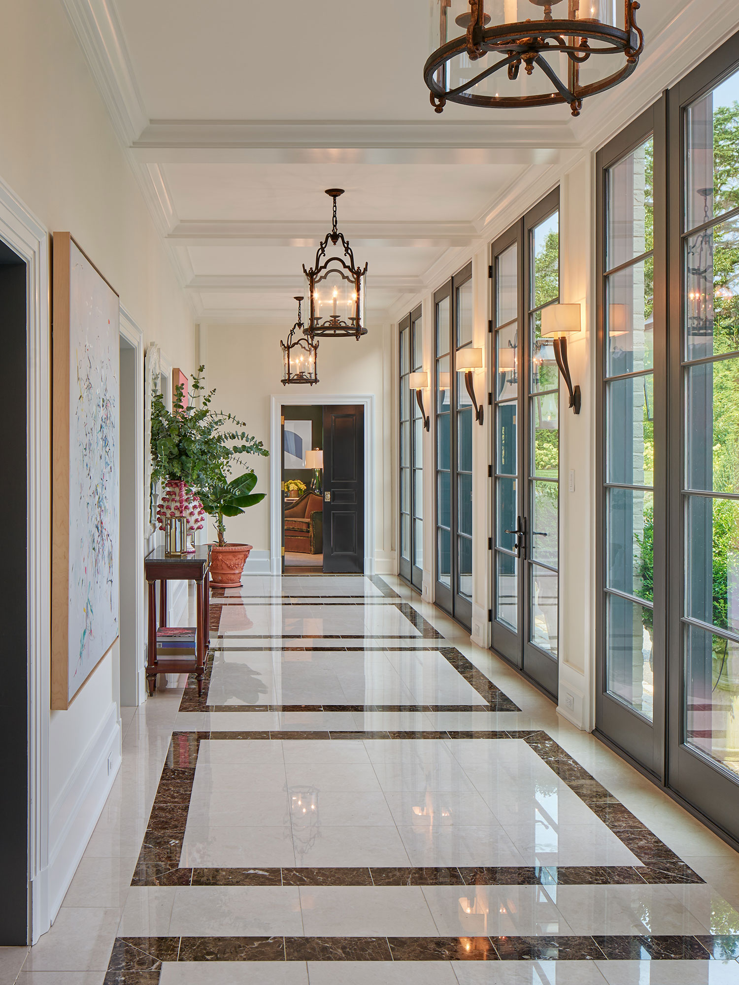 Archer & Buchanan Architects | Halkin | Mason Photography -We’d say this beautiful, traditional home, designed by Archer & Buchanan hits all the high notes of style. That is as livable and updated as it is fresh and character-filled.  Entry with marble floors and hanging lanterns