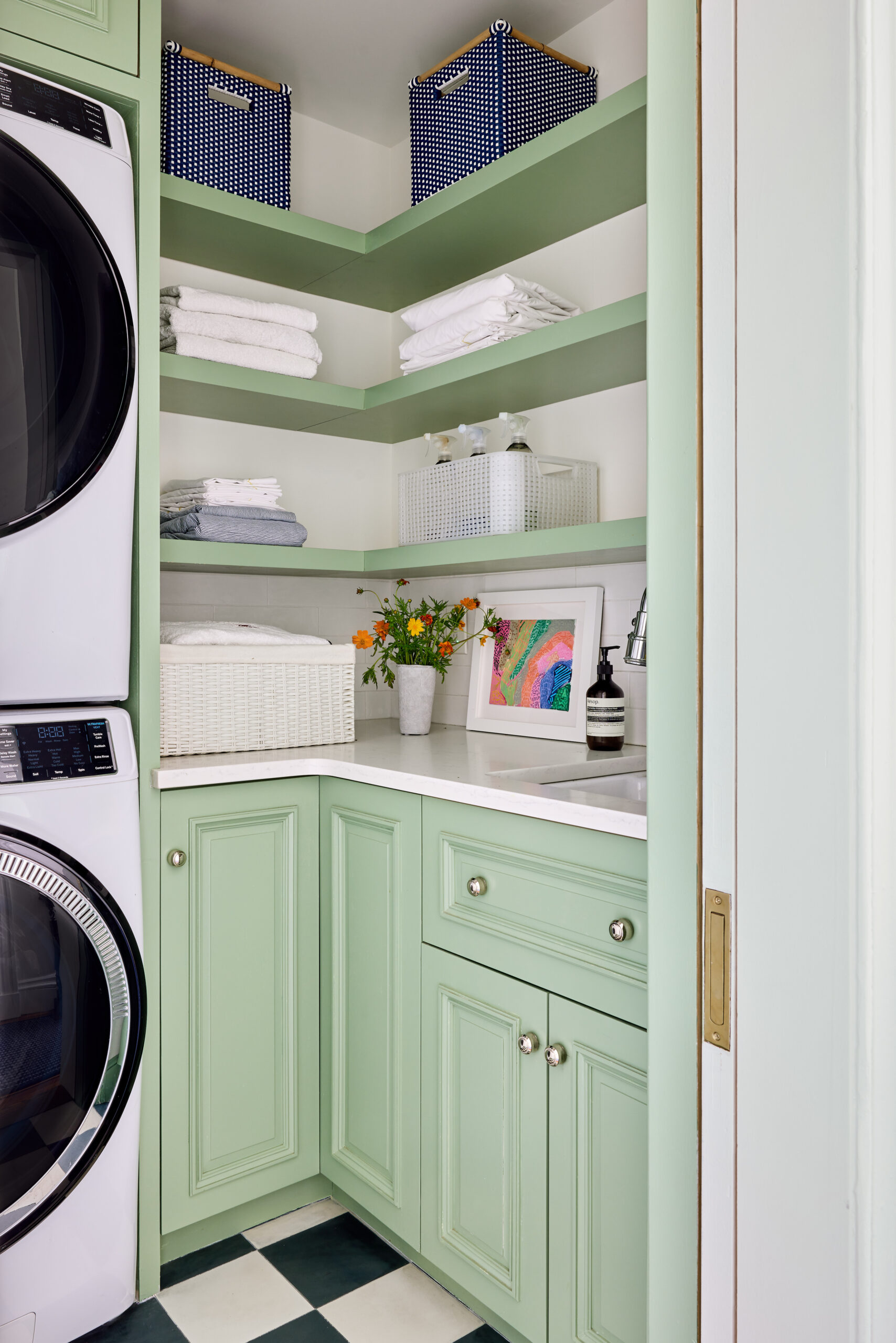 Jennifer Hunter Design | Kristen Francis Photography | Frances Bailey Styling - Charming laundrey room with green cabinets and white quartz countertops