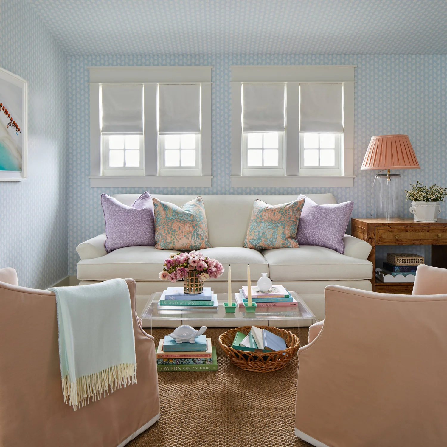 Sometimes a blue and white palette can feel predictable, but in this utterly charming Kara Miller-designed beach house, photographed by , Laurey W. Glenn and styled by Lindsey Ellis Beatty, it feels fresh and inviting. The various color tones, natural materials, and textured accents ground each space, creating a livable home with plenty of style.