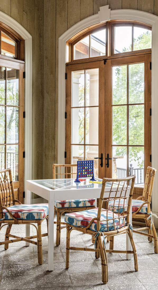  This stunning traditional home, designed byAlexa Stevenson Interiors, with photography by Jeff Herr, is the perfect mix of traditional touches and updated details, well-suited for family, entertaining and more. Game table in corner of living room