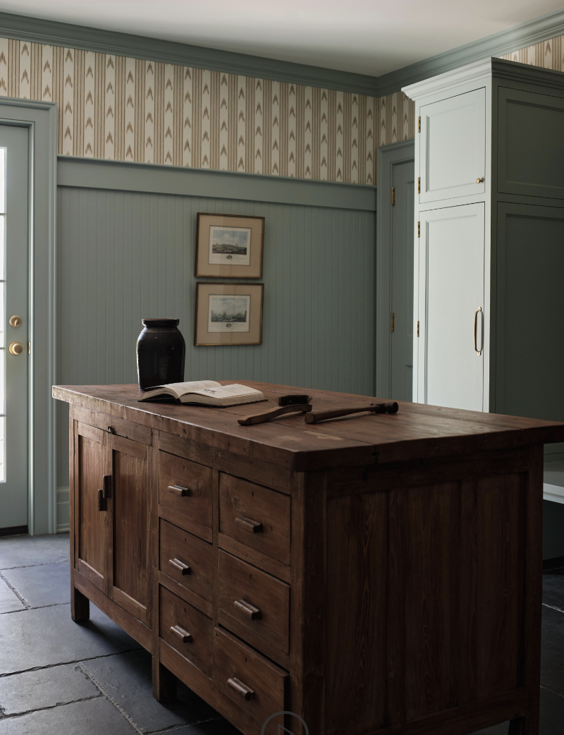 Check out this gorgeous home designed by one of our favorites, Sabbe Interior Design. with beautiful photography by Joseph Bradshaw.  - beautiful mudroom with Serena & Lily wallpaper and farmhouse sink in sage green - love the antique wood island